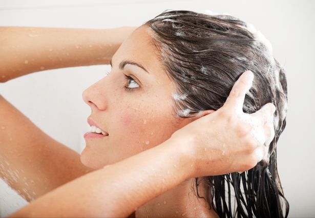 Woman-washing-her-Hair-with-Shampoo Woman-washing-her-Hair-with-Shampoo